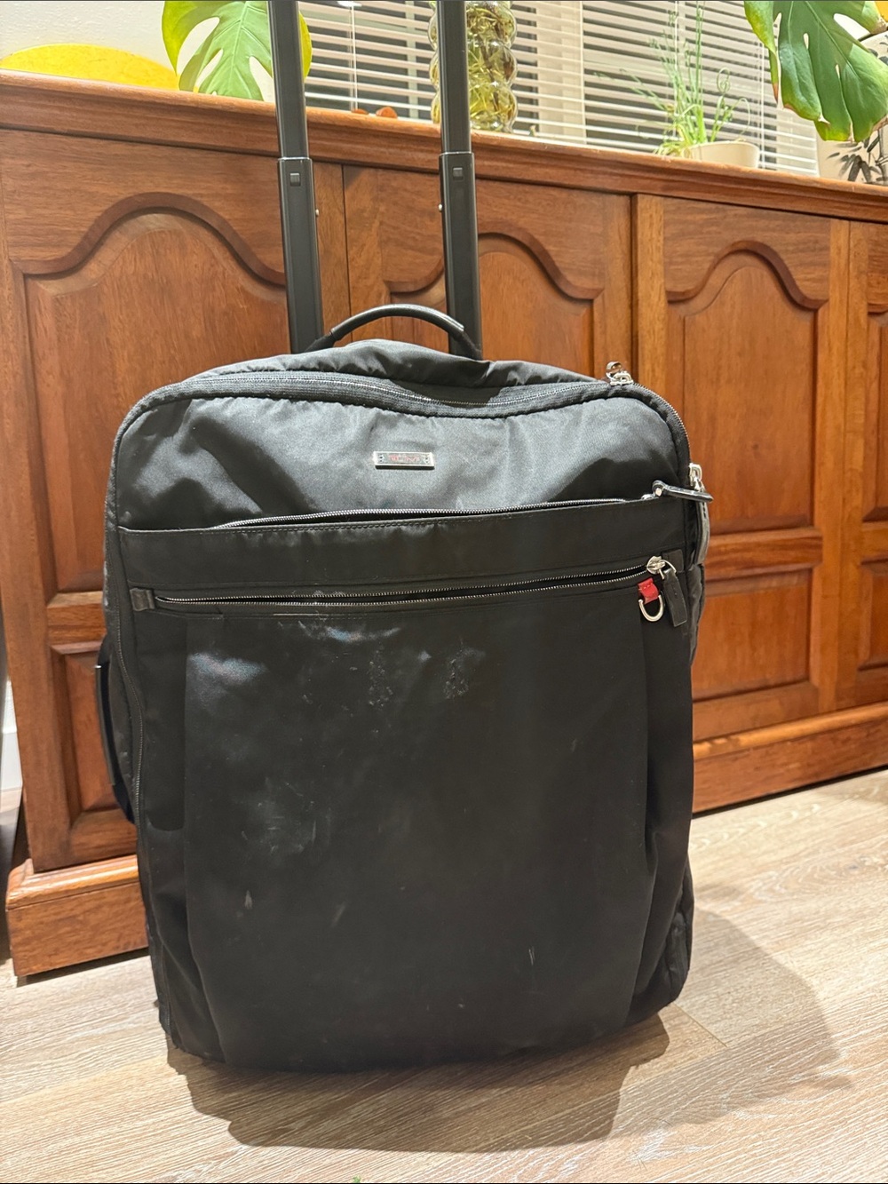 Tumi Black Ballistic Nylon Rolling Wheeled Carry-On Suitcase